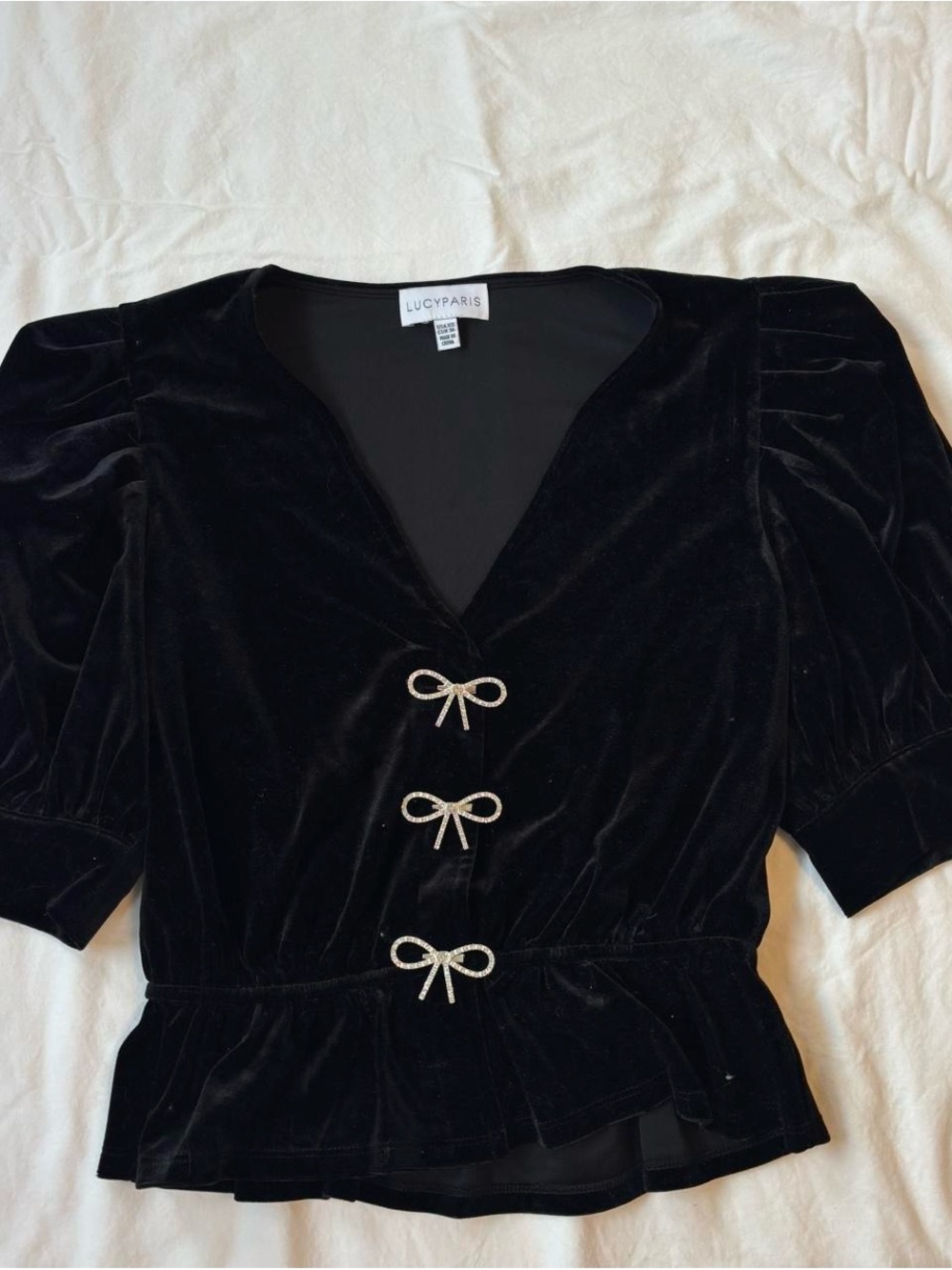 Lucy Paris Black Velvet Peplum Top with Decorative Bow Closures